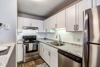 Chef-Inspired Kitchens Feature Stainless Steel Appliances at Audenn Apartments, Bloomington, Minnesota